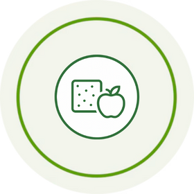 White plate with green rim featuring a green icon of a cookie and an apple.