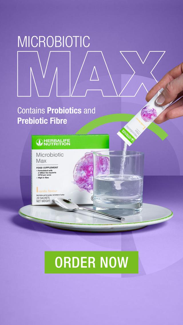 Promotional image of Herbalife Microbiotic Max with packaging, glass of water, and spoon on a purple background.
