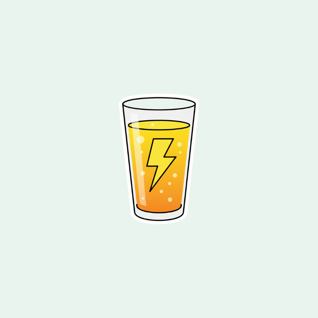 Glass of orange juice with a yellow lightning bolt on a light gray background