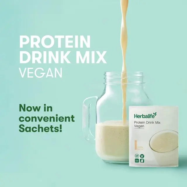 Herbalife Vegan Protein Drink Mix being poured into a glass with packaging on a light green background